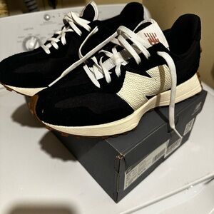 Women’s New Balance 327 worn once . Black and white with original box